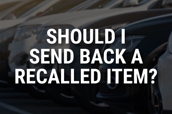 A car hood with the words, "Should I Send Back a Recalled Item?"