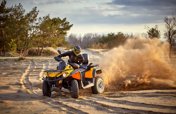 A person riding on an ATV.