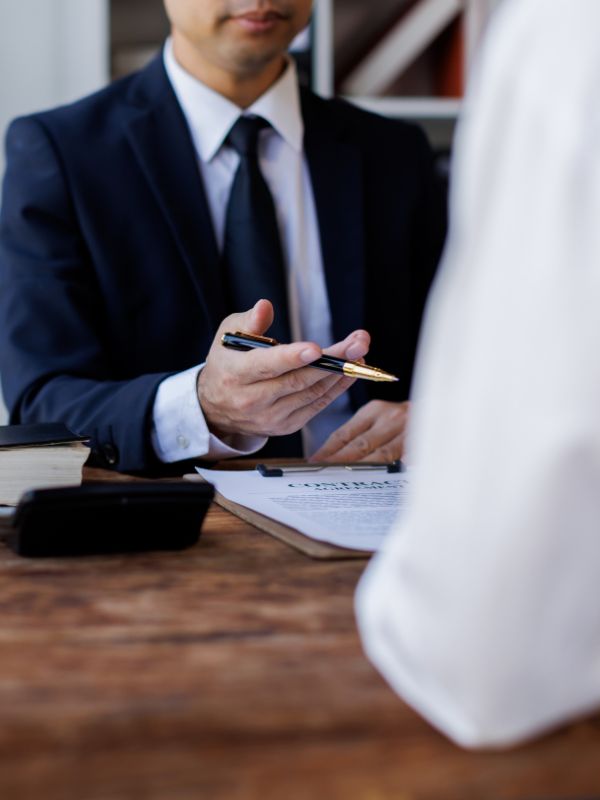 A personal injury attorney talking to a client.